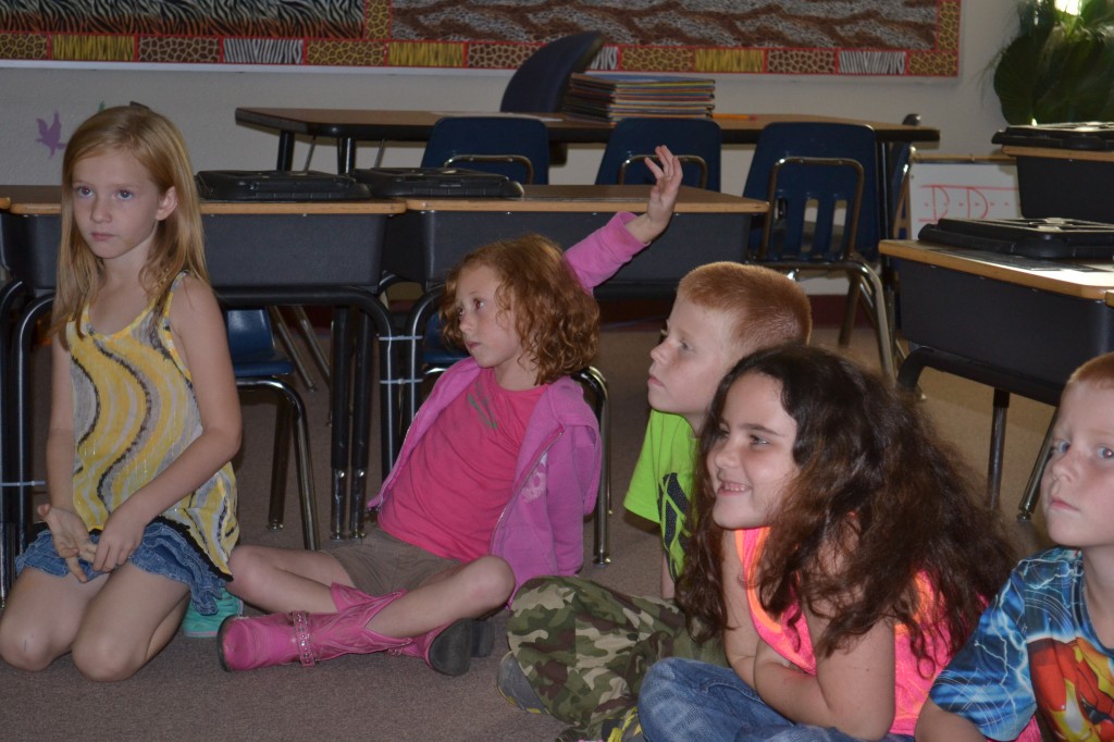 Butner student raising hand in classroom 