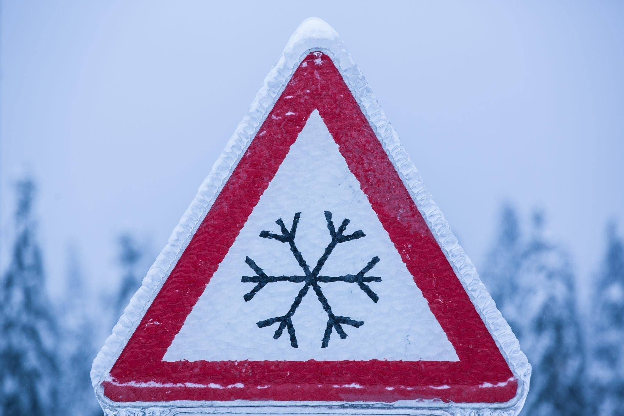 Stock photo of iced over snowflake sign