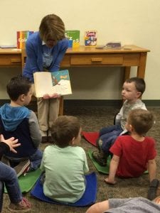 Nancy reads to children