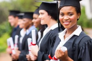 Photo of college graduates with diplomas