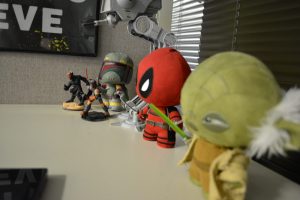 action figures on Arturo's desk