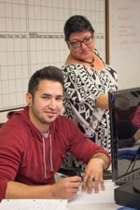 A student and teacher at Murray State College